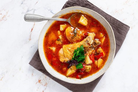 Souzi soup. Georgian dish, meat with oats, tomato sauce and herbs