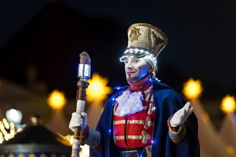 A Black-winged Stilt walker at the Christmas market WeihnachtsZauber Gendarmenmarkt on the