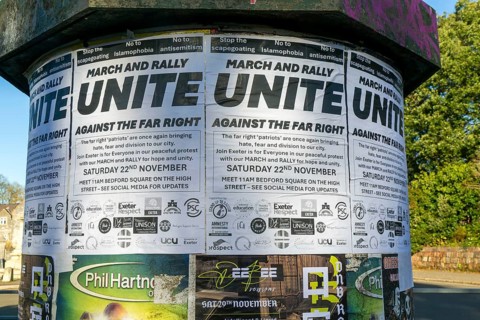 Poster notice about March and Rally, Unite against the Far Right, Exeter, Devon, England, UK