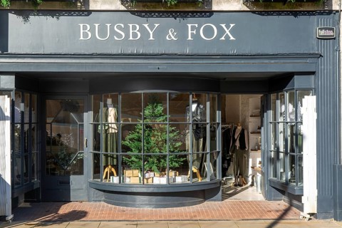 Shopfront window display Busby & Fox shop store, Cathedral Yard, Exeter city centre, Devon,