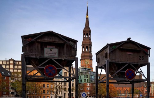 Stray silos, silo with road salt, on stilts as protection against flood and flooding, behind it the