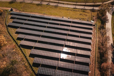 Overview of solar modules in ordered formation with sunlight, Bau PV Freifaechenanlage, Weil der