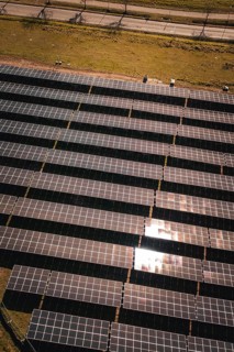 Brilliant solar modules photographed in orderly rows in the sun, PV Freifaechenanlage Bau, Weil der