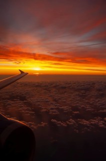 View from airplane window at sunrise