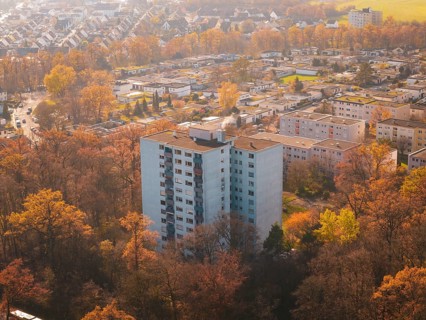 Multi-family house in autumn surroundings, surrounded by an urban silhouette, MÃ¼hlacker, Enzkreis,