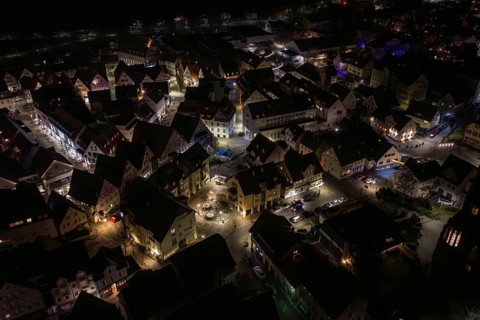 Extensive city view at night with illuminated houses, Nagold, Calw district, Germany