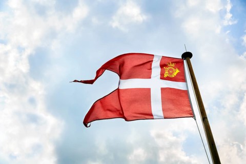 Danish postal flag, national flag with crown and post horn on a mail ship, ChristiansÃ¸ and