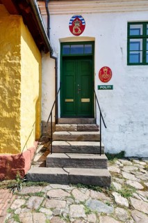 Stairway, police station entrance, sign with the words Police, ChristiansÃ¸, Christiansö,
