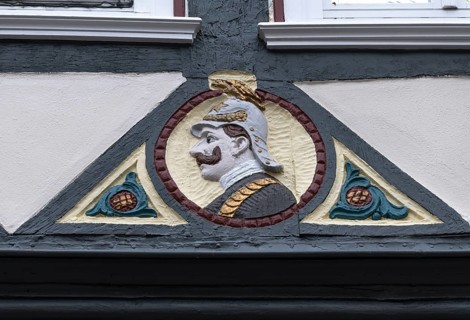 Decoration on half-timbered house, BarfÃ¼sserstraÃŸe, Marburg, Hesse, Germany