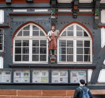 Decoration on half-timbered house, former press house, market, Oberstadt, Marburg, Hesse, Germany