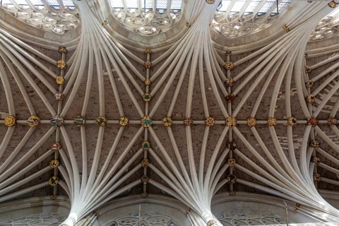 Looking up at vaulted ribbed ceiling inside Exeter cathedral church, Exeter, Devon, England, UK