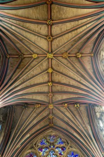 Looking up at vaulted ribbed ceiling inside Exeter cathedral church, Exeter, Devon, England, UK