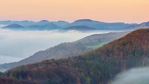 View from the Gisliflue of the Jura foothills covered in fog, in the light of dawn, Talheim,