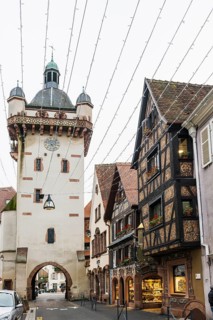 Clock tower and artfully painted half-timbered houses, Tour de l'Horloge, SÃ©lestat, Schlettstadt,