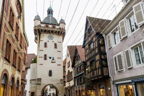Clock tower and artfully painted half-timbered houses, Tour de l'Horloge, SÃ©lestat, Schlettstadt,