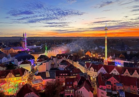 View from above from the Ferris wheel of the atmospheric All Saints Fair in the evening, Altstadt,