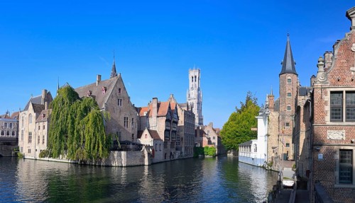Famous view of Bruges old city with the Belfry and the Dijver canal, Bruges, Flanders, Belgium