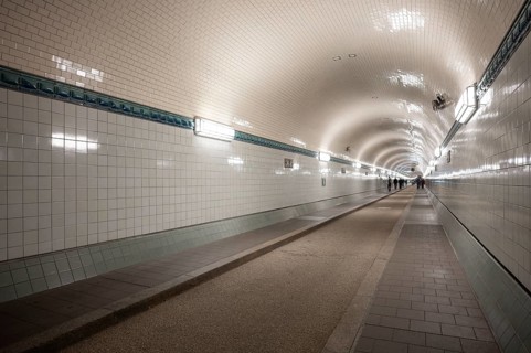 Interior view, pedestrians crossing tunnel, mopping effect, tube, historic old Elbe Tunnel, Free
