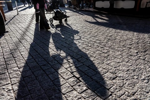 Shadows of people on the ground, low sun, winter, silhouettes, stroller, Germany