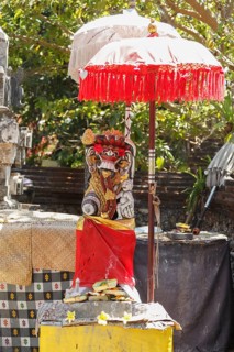 Demon, figure in Pura Dalem Penataran Taman, Sanur, Bali, Indonesia