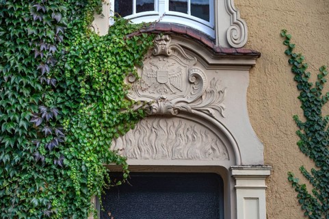 Stucco decoration above the entrance to Johanneum, built in 1905, near St. Johannis 1-3, Hanseatic