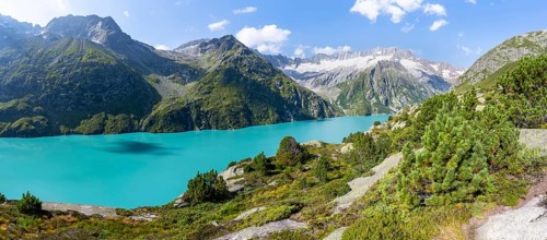 Turquoise blue mountain lake GÃ¶scheneralpsee, picturesque mountain landscape with dammastock and