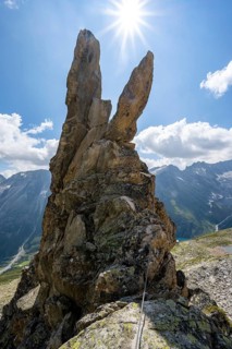 Crocodile rock formation with sun star, via ferrata Krokodil-Bergsee am Bergseeschijen-Vorbau,