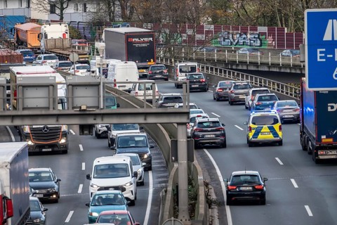 A40 motorway, Ruhrschnellweg, police car, patrol car during an emergency trip with flashing lights,