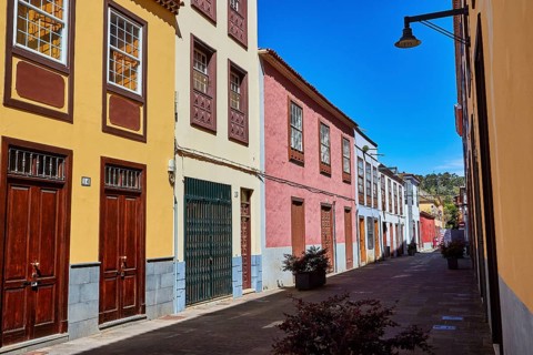 Narrow alley with colorful painted classic buildings and sunny weather, UNESCO World Heritage Old