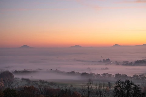 Three Kaiserberge mountains in golden morning light, Hohenstaufen, Aichelberg. Spectacular dawn
