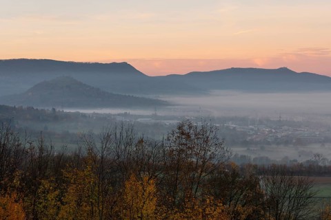 The majestic Teck Castle towers over the fog in the foothills of Alb. Aichelberg View of Teck