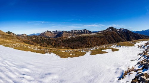 Snowfield on the Trattberg Alm with a view of the Osterhorn Group, Salzkammergut, Salzburg, Austria