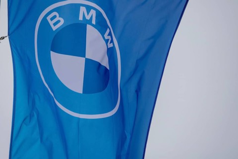 Flag with BMW logo on a car dealership