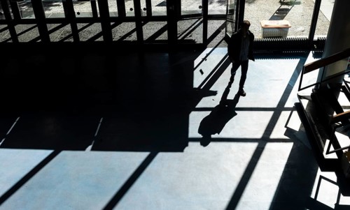 Foyer in a building of the Technical University of Berlin, light and shadow from people at the