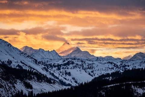 Grossglockner peaks at sunset in winter, spectacular cloudy skies, Hochbrixen, Brixen im Thale,