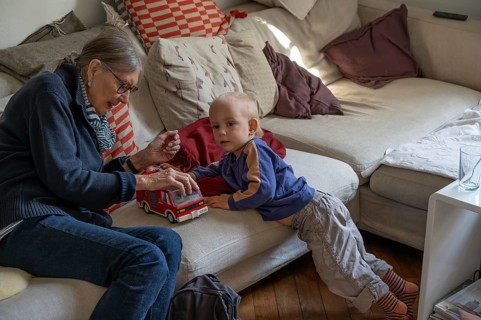 Great-grandmother playing with her great-grandson, two years old, Othenstorf, Mecklenburg-Western