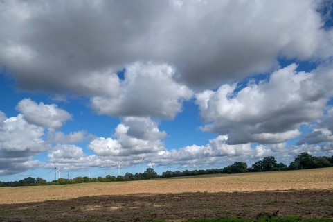 Landscape with wind turbines, cluster clouds (Cumulus), Mecklenburg-Western Pomerania, Germany