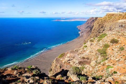 Castillejo viewpoint, view from the Risco de Famara cliff to the coast and the sea, Lanzarote,