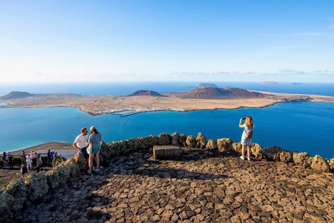 Tourists on the viewing platform at the Mirador del RÃ­o viewpoint, in the evening light, view of