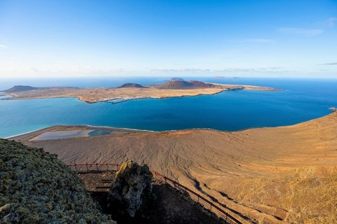 View of La Graciosa island with volcanic craters in the evening light, Mirador del RÃ­o viewpoint
