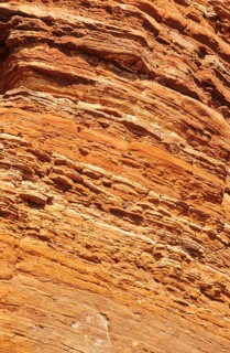 Close-up of red and orange rock layers of a rock formation, rock, slope rocks, red cliffs with