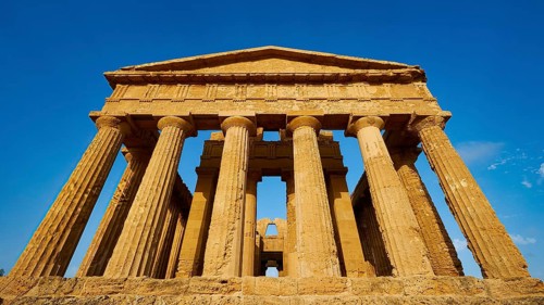 Temple of Concordia, imposing ancient temple with classical columns against a clear sky, Valley of