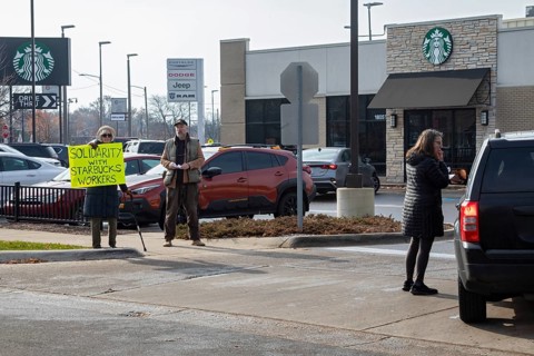 Detroit, Michigan USA - 15 November 2025 - People picket a Starbucks store in solidarity with a