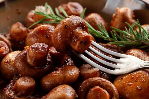 Fried mushrooms, with spices, in soy sauce, vegetarian food, homemade, no people