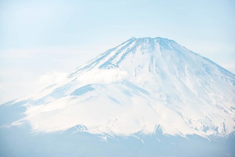 Snow-covered summit of Mount Fuji volcano in spring, ÅŒwakudani, Hakone, Japan