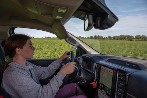 Young girl learns to drive a pickup truck on private property, Mecklenburg-Western Pomerania,