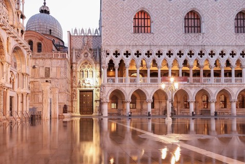 Before sunrise, Doge's Palace and Porta della Carta, during Aqcua Alta, Venice, Italy