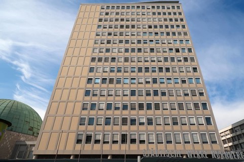 Facade of the heritage-protected PlÃ¤rrer skyscraper from the 1950s, today EWAG skyscraper,
