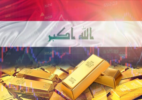 Gold bars on Iraq flag in background. Gold bars stacked on Iraqi flag. Concept of Iraq gold