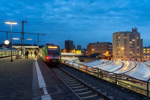 Essen-Steele S-Bahn station, passengers waiting for the train late afternoon, in autumn, Essen,